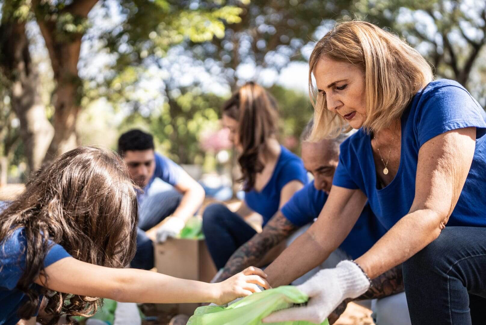 Volunteers sorting donations outdoors