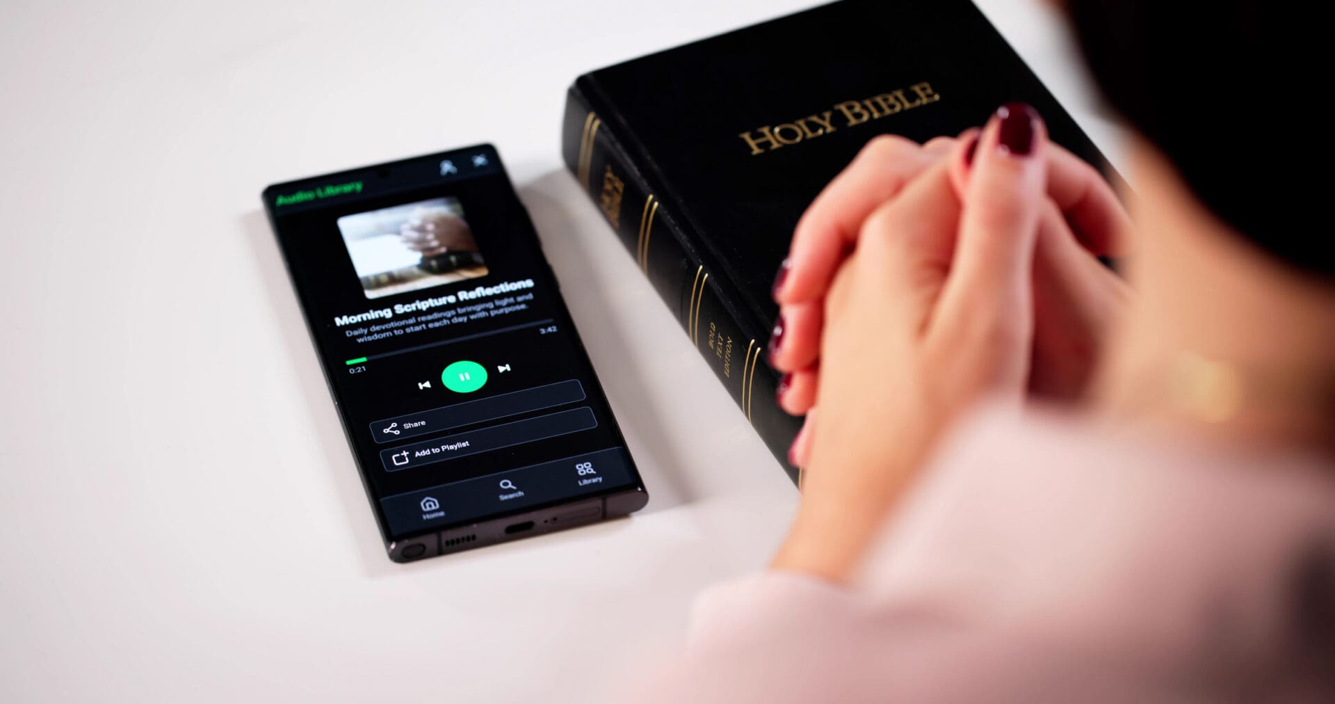 Praying with Bible and phone app