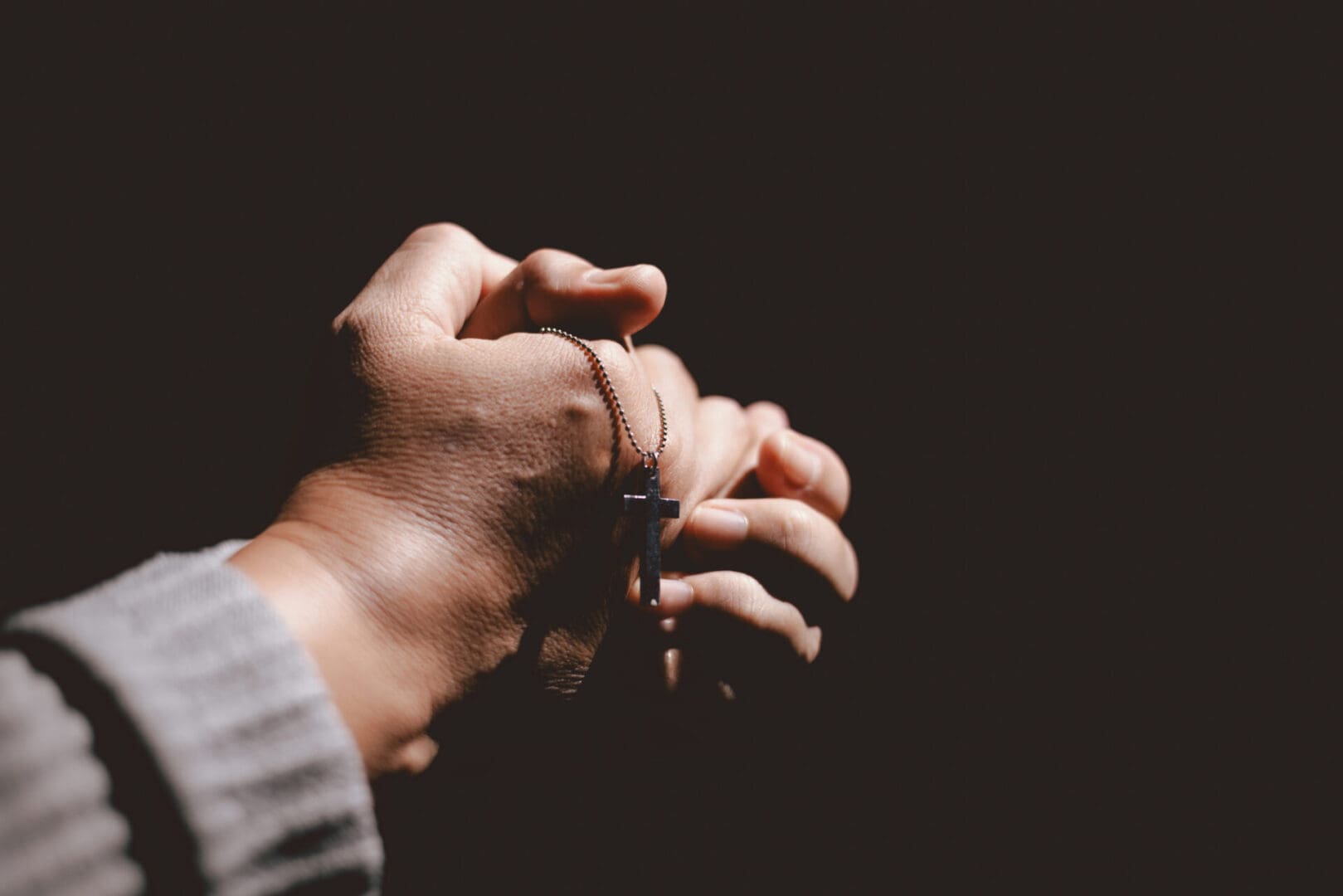 Close-up of hands in prayerful gesture
