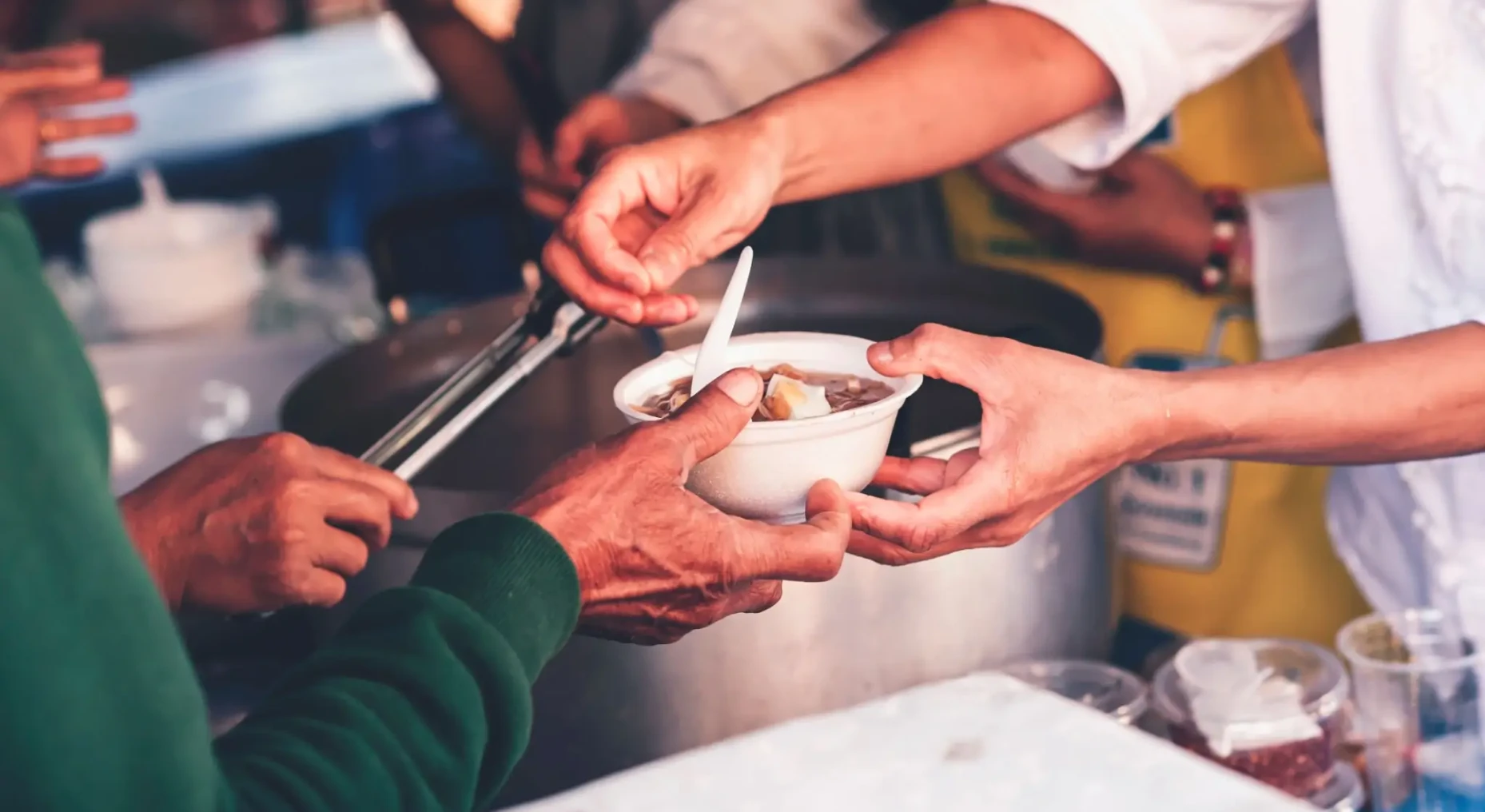 Soup distribution at charity event