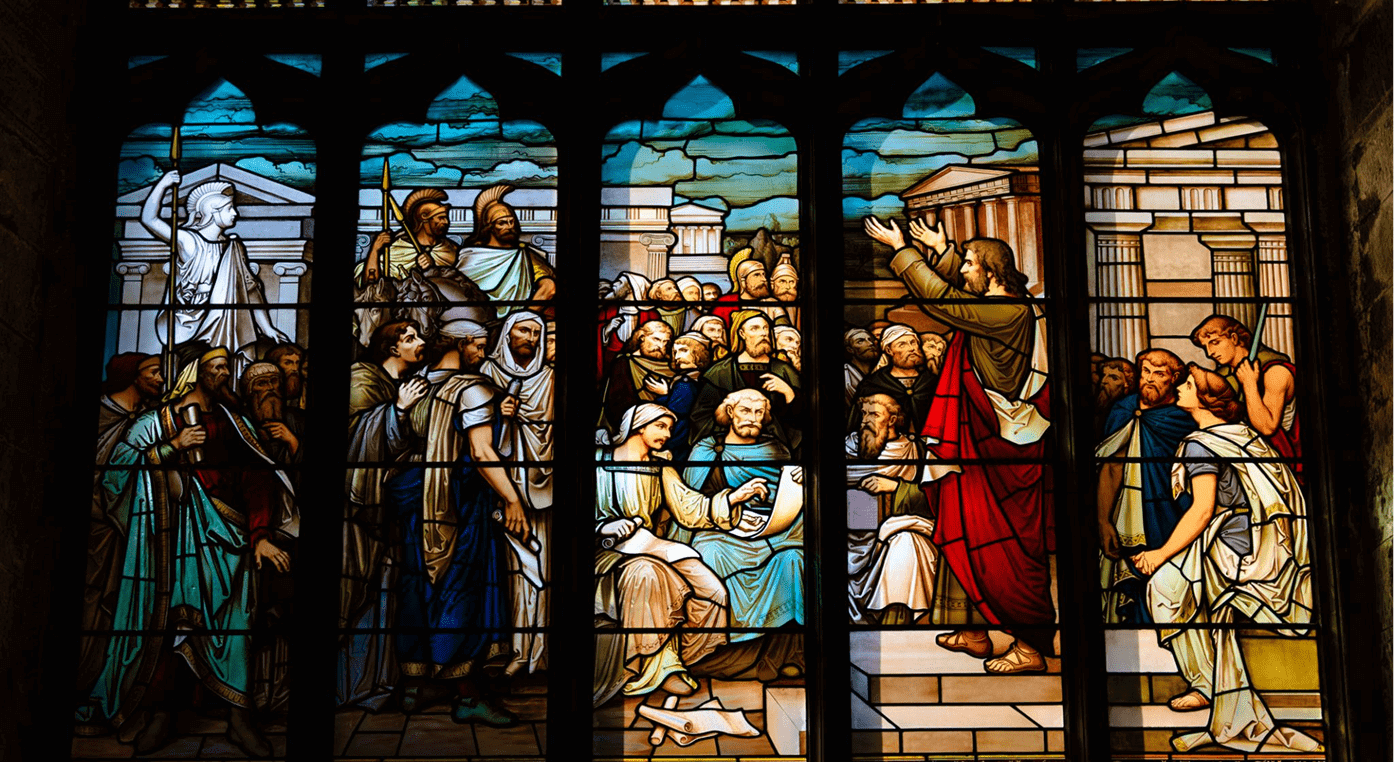 Colorful stained glass window with figures